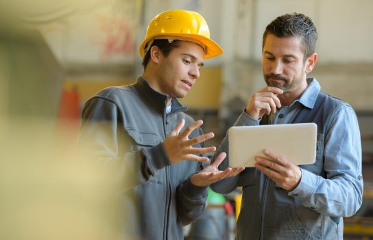 Boss,And,Worker,Checking,Results,On,The,Tablet